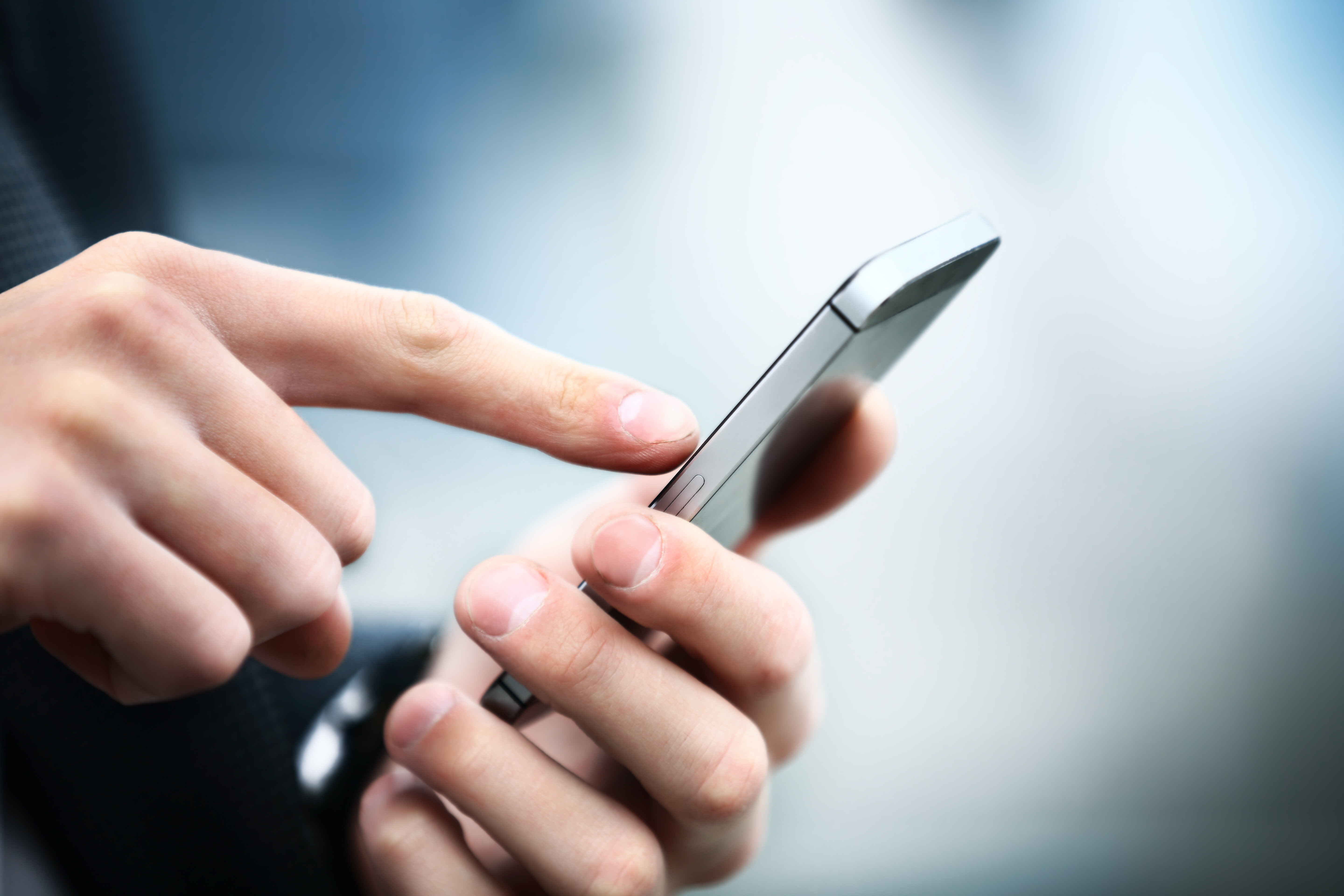person holding iphone