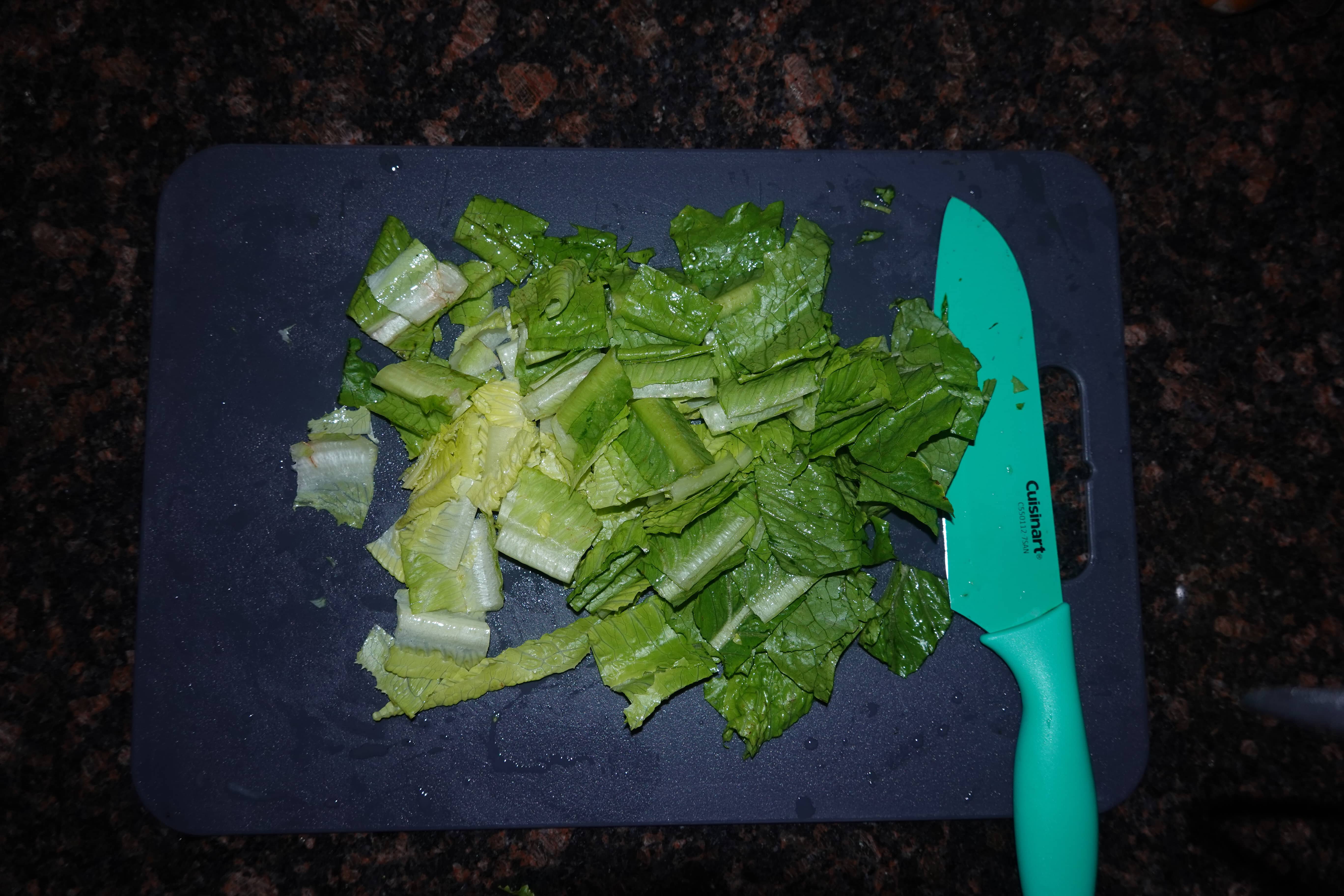 chopping romaine lettuce for salad recipe